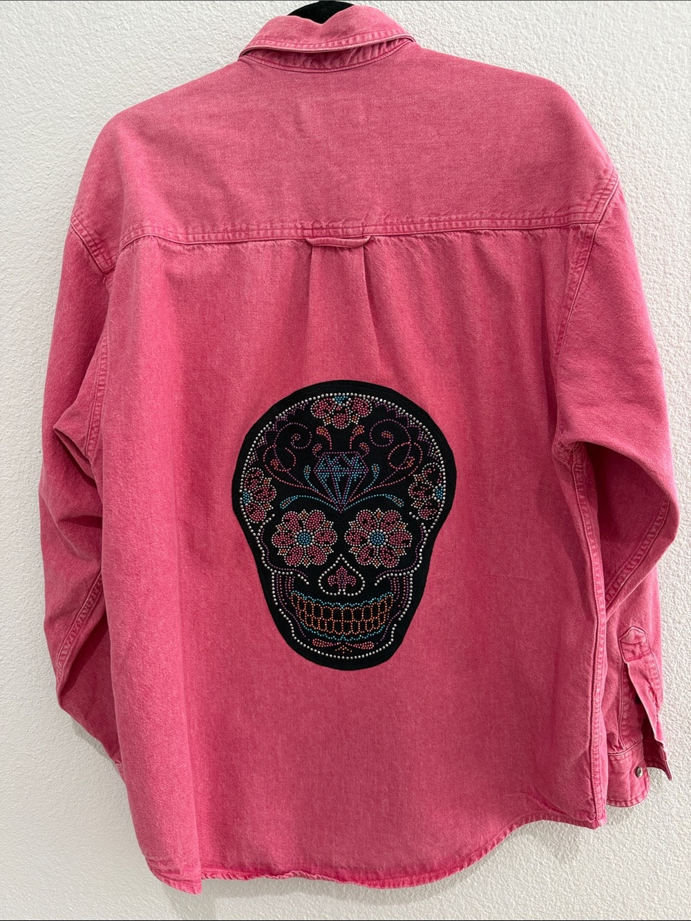 Upcycled Eddie Bauer Faded Red Denim Jacket with Sewn Appliqué of Sugar Skull